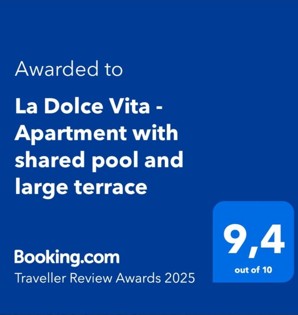La Dolce Vita - Apartment With Shared Pool And Large Terrace Lido delle Nazioni Bagian luar foto